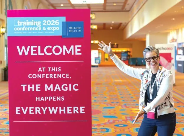 The sign—and smile—say it all! PHOTOGRAPHY BY HUGHES FIORETTI PHOTOGRAPHY