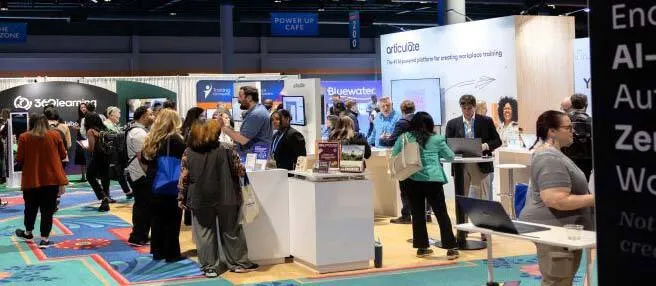 Checking out new training solutions in the Expo Hall. PHOTOGRAPHY BY HUGHES FIORETTI PHOTOGRAPHY