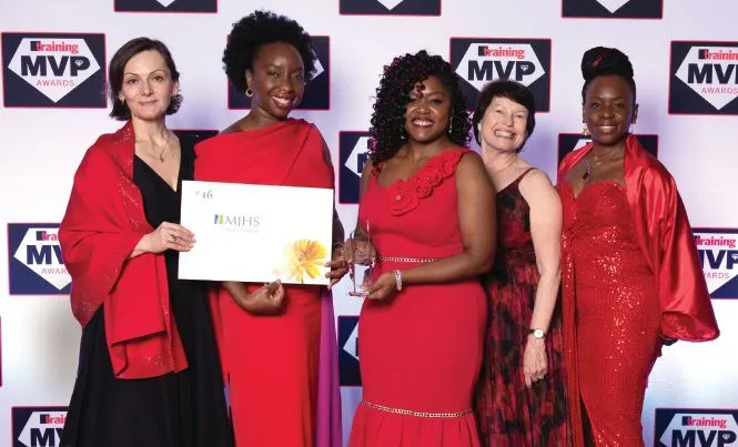 The ladies in red from MJHS rock the red carpet. PHOTOGRAPHY BY HUGHES FIORETTI PHOTOGRAPHY