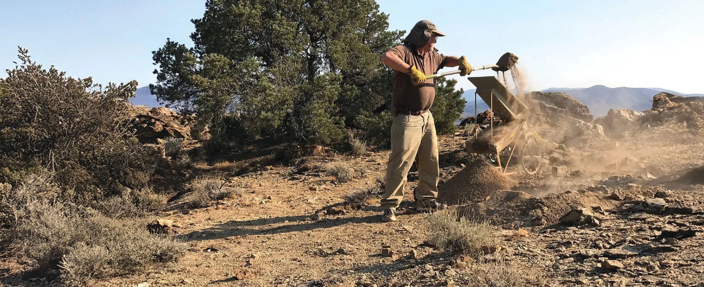 Prospector drywashing in Nevada desert