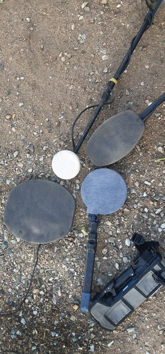 Worn coil cover on metal detector