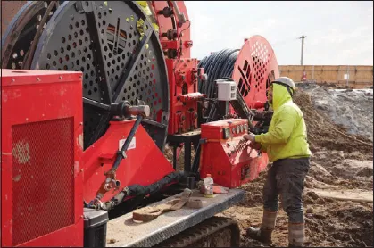 Quality loop installers allow the pipe to be fed smoothly into the holes and are critical to a geothermal job’s success. All photos courtesy Nicholas Bosch.